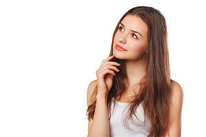 Beautiful young woman wearing curious expression