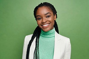 Smiling young professional woman with confident smile