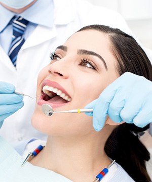 patient getting dental checkup near Shrewsbury