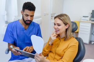 Patient and dentist talking during cosmetic consultation