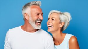 Laughing mature couple with beautiful teeth