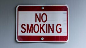 Red and white “no smoking” sign